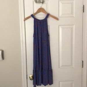 Blue flowered sleeveless dress.